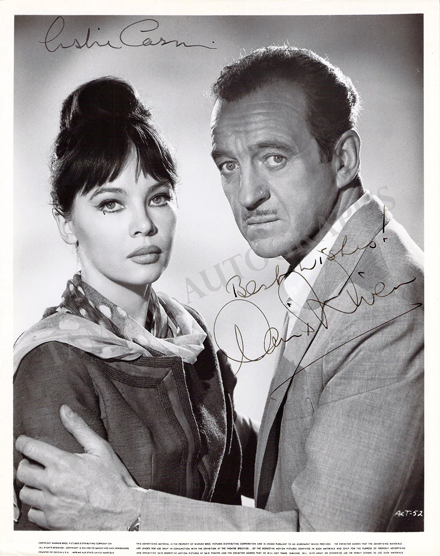 Niven, David - Caron, Leslie - Signed Photograph in "Guns of Darkness"