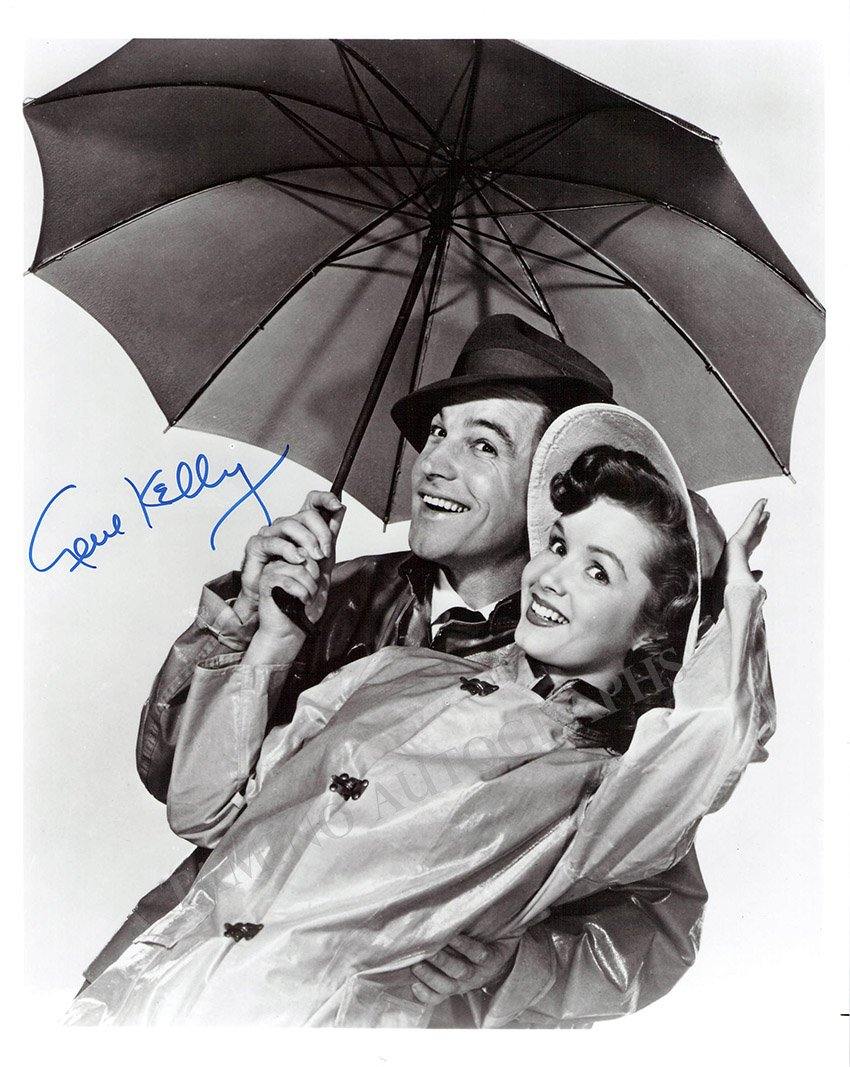 Kelly, Gene - Signed Photograph in "Singing in the Rain"